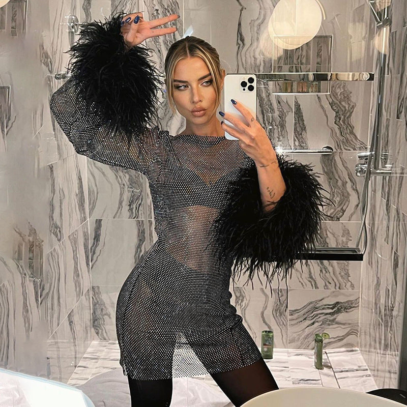 Damen Glitzerndes Netzkleid mit Puffärmeln WOLFF - Image 2